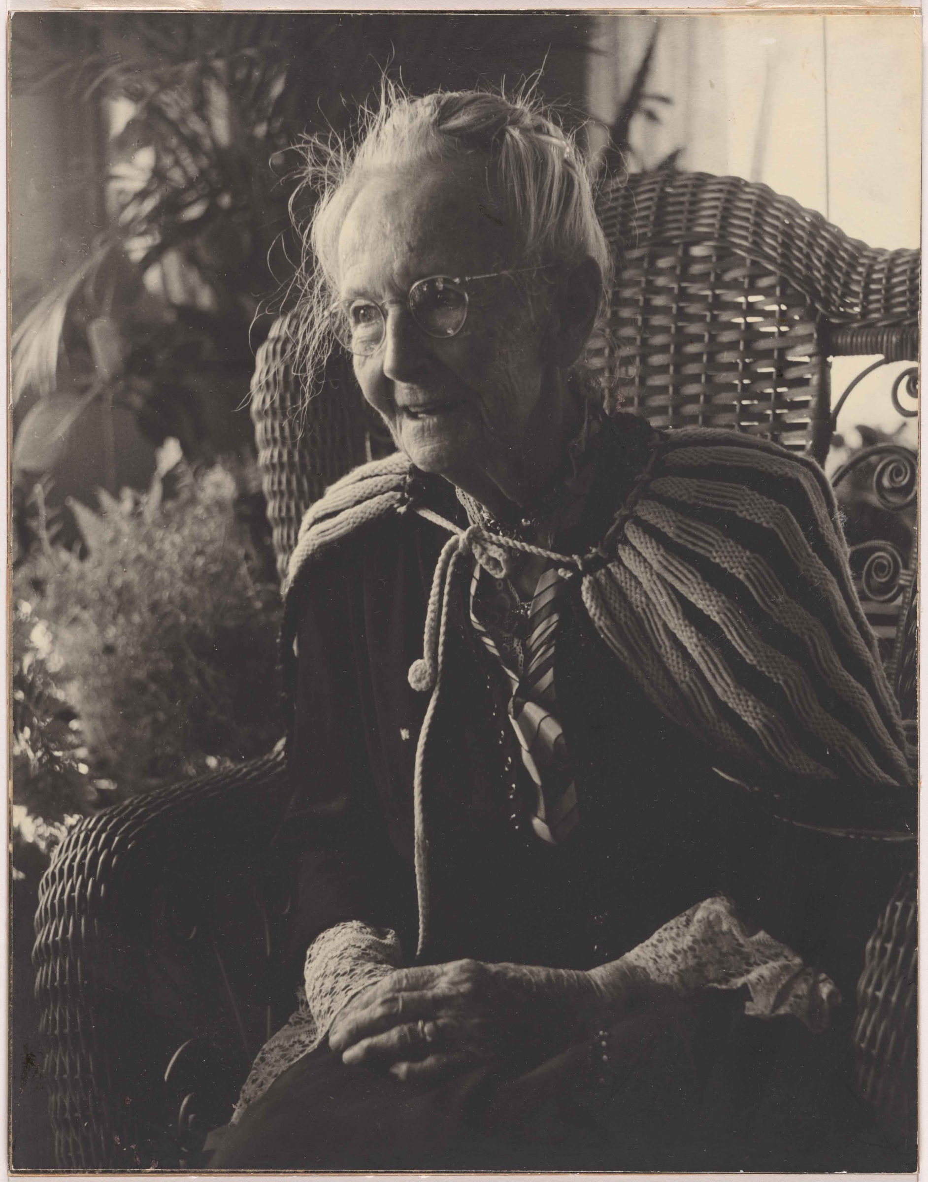 Grandma Moses sitting in a chair