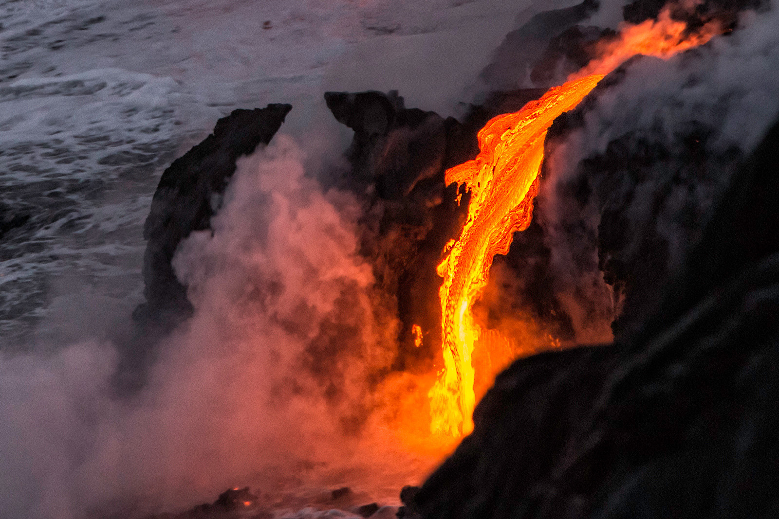 Lava entering the ocean in Hawaii. (Photo by Bill Shupp)